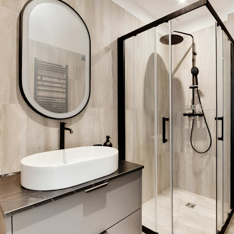 Get ready in the modern bathroom for a night out in the City of Light