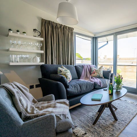 Soak up views of the historic rooftops curled up on the sofa