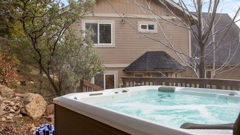Soak in the bubbling hot tub as the day draws to a close