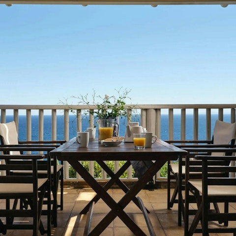 Begin the day with breakfast overlooking the sea