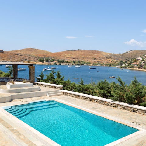 Float around in your private  pool as the sun rises above the hills