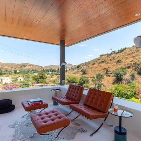 Sit back and relax on the leather chairs with your morning coffee