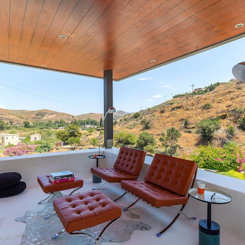 Sit back and relax on the leather chairs with your morning coffee