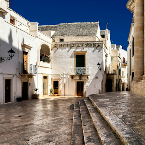 Visit the picturesque town of Locorotondo, twenty-minute drive away