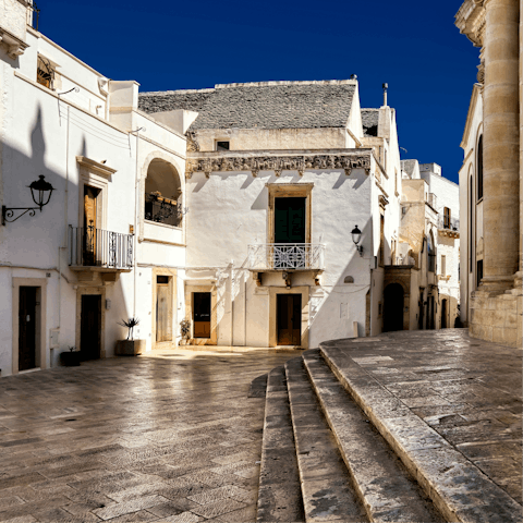 Visit the picturesque town of Locorotondo, twenty-minute drive away