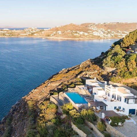 Stay on a luxury villa complex with access to a jetty and the Aegean Sea