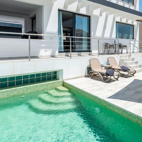 Take a dip in your private pool to cool off in the midday sun