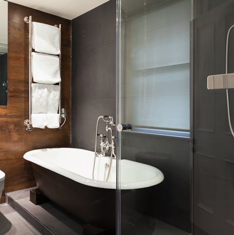 Treat yourself to an indulgent bubble bath in the freestanding tub