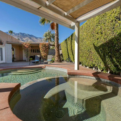 Soak up the mountain views from the private pool and spa