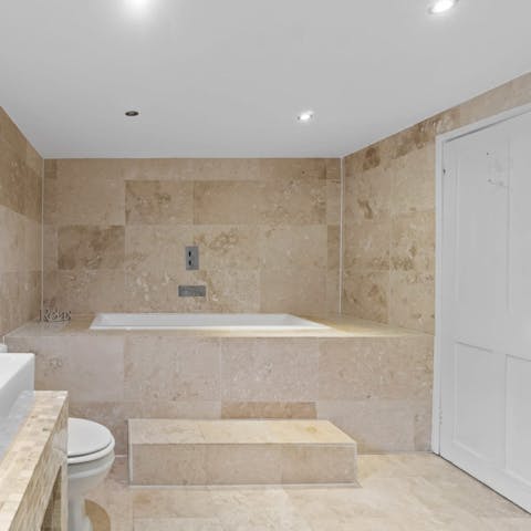 Sink into the tub and unwind after a day on the beach