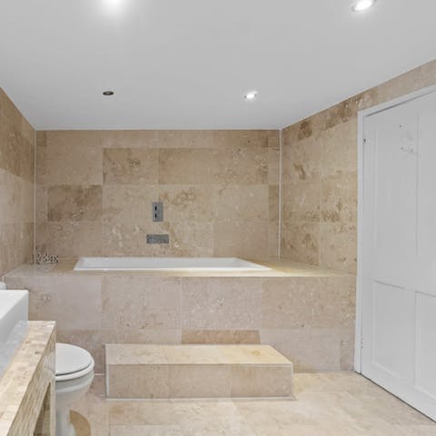 Sink into the tub and unwind after a day on the beach