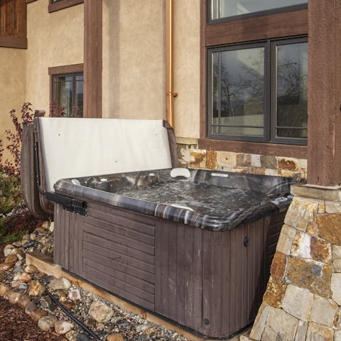 Enjoy a long soak in the private hot tub