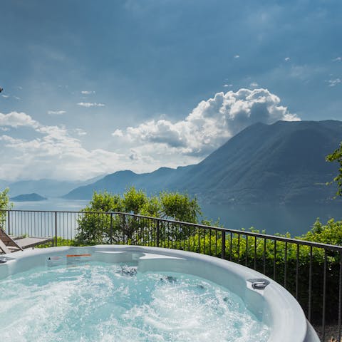 Take a luxurious dip in the hot tub as you admire the view