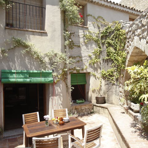 Head to the plant-filled patios and courtyards for a meal outside