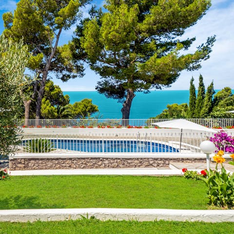 Take in the Tyrrhenian Sea views from the pool