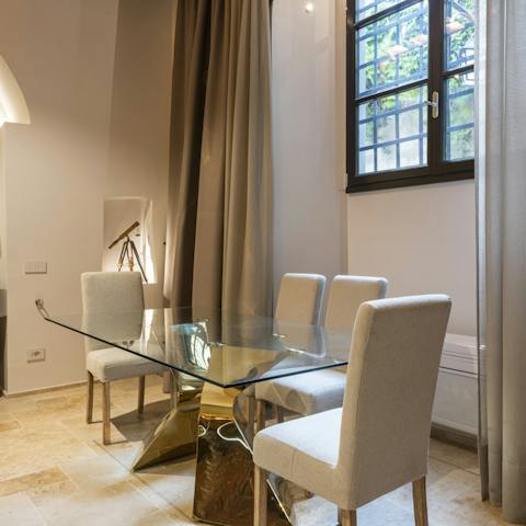 Sit down to an elegant meal at the dining table when you're not out sampling the local trattorias