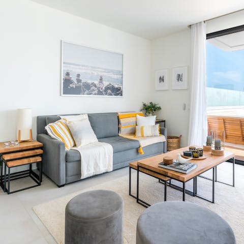 Kick back and relax in the comfort of the bright living room