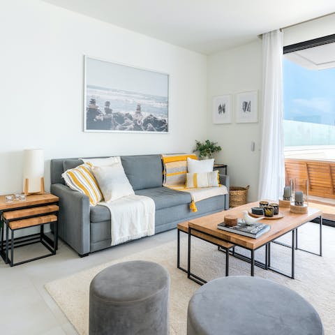 Kick back and relax in the comfort of the bright living room