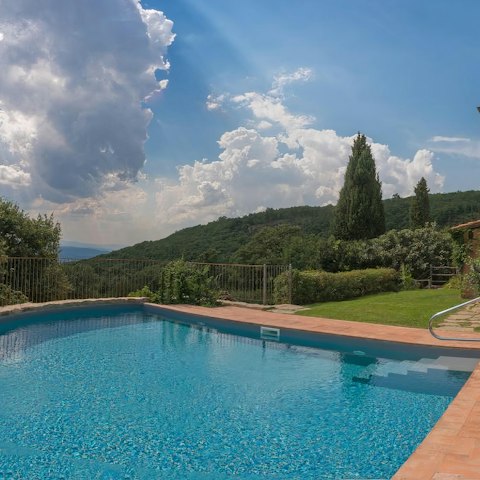 Swim in the private pool, surrounded by nature