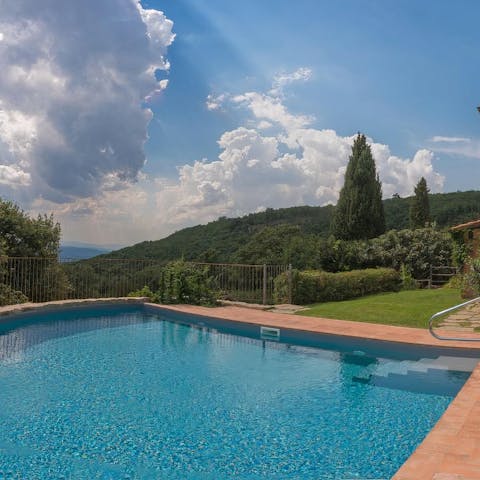Swim in the private pool, surrounded by nature