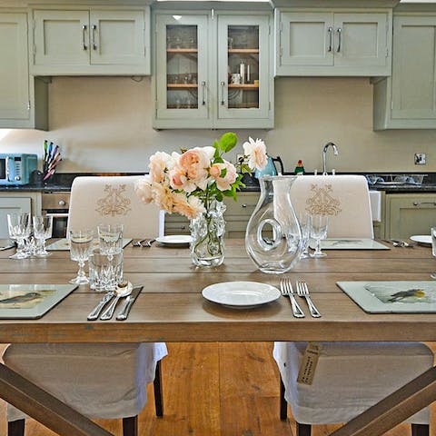 Gather together for a meal in the country-style kitchen