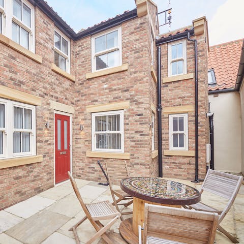 Enjoy an alfresco breakfast on the sunny patio