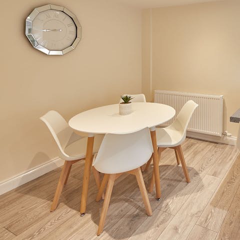 Feast on some traditional fish and chips around the dining table