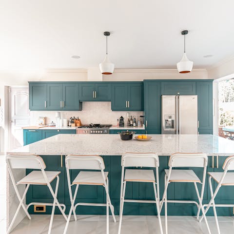 Whip up a tasty breakfast in the teal kitchen