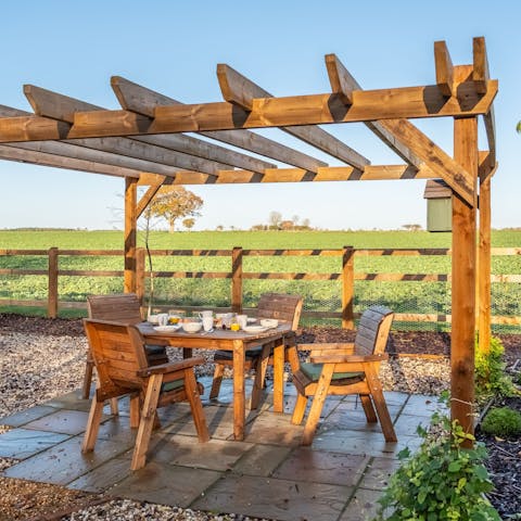 Enjoy delicious alfresco meals with stunning country vistas before you
