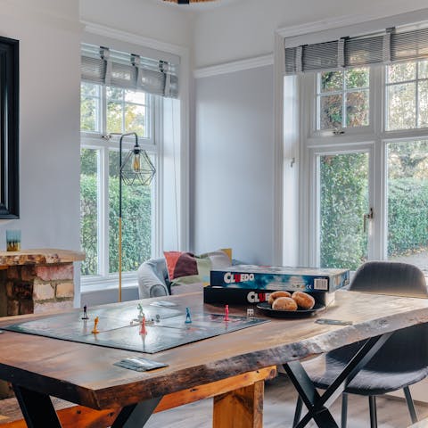 Enjoy a lively night of board games in the spacious dining room