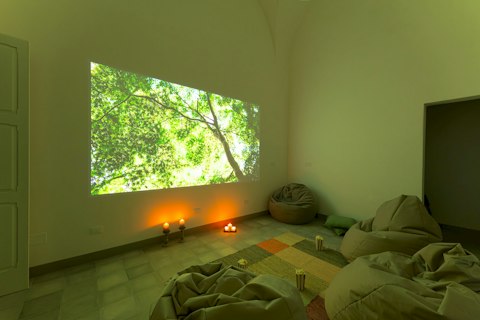 Sink into bean bags for a film night by candlelight