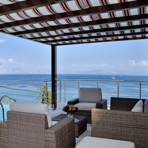 Enjoy breakfast with a view under the pergola
