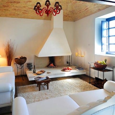 Snuggle in front of the fire in the stylish lounge