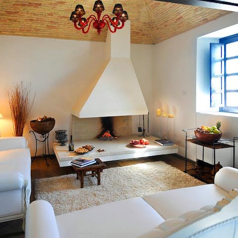 Snuggle in front of the fire in the stylish lounge