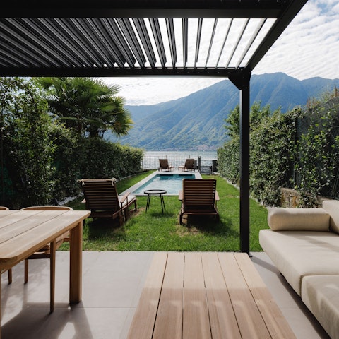 Savour the scenery from the lakeside pool and patio