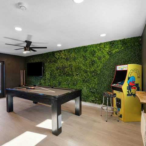 Battle it out together in the game room