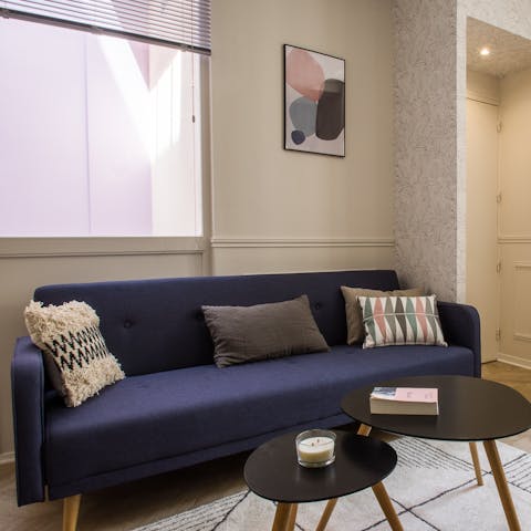 Kick back in the stylish living area with a glass of French red after a day of exploring