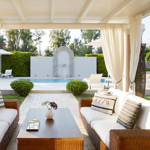 Seek solace from the sun and enjoy a drink in the outdoor seating area