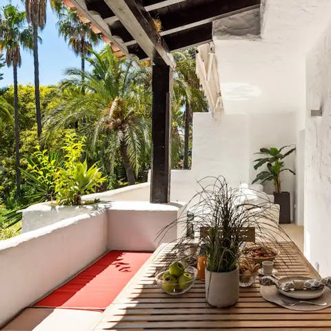 Sip on some homemade piña coladas on the balcony