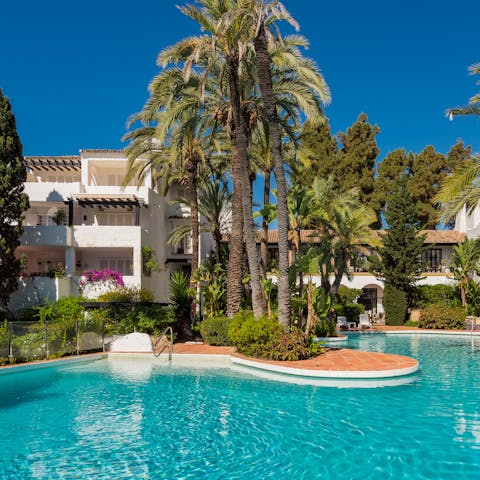 Enjoy a dip in the building's gorgeous pool