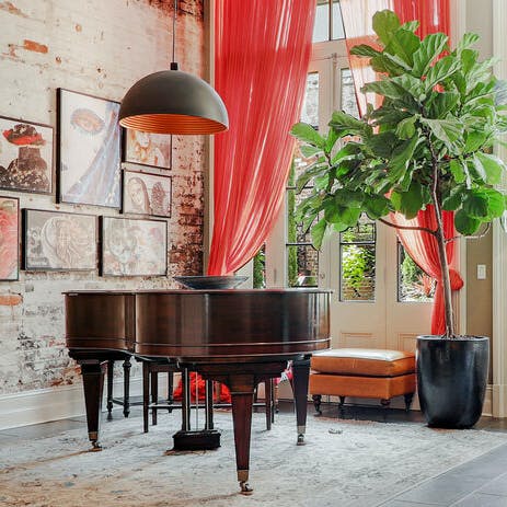 Play a jazzy tune on the building's piano