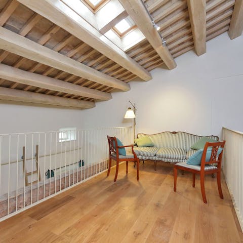 Find a quiet spot to read on the mezzanine