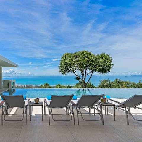 Savour spectacular sea views as you lounge poolside