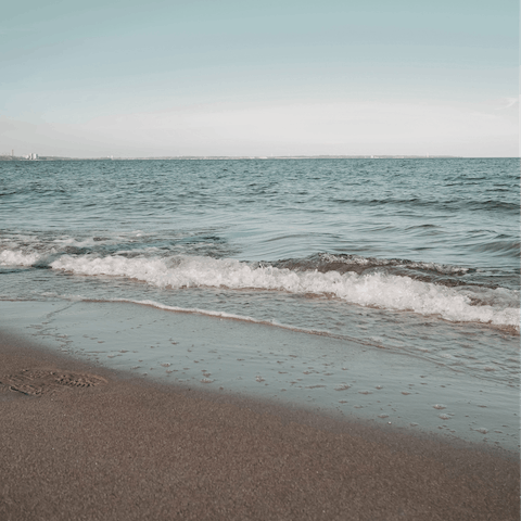 Head down to the local beach – it's just 200 metres away
