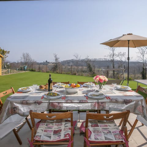 Eat out on the covered terrace in your private garden, with far-reaching views