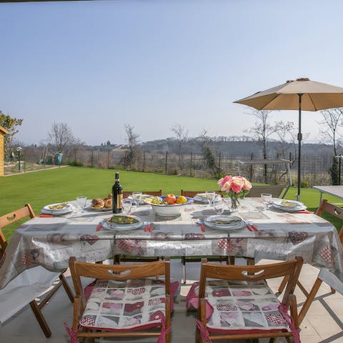 Eat out on the covered terrace in your private garden, with far-reaching views