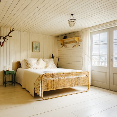 Look out over the sand dunes from the comfortable master bedrooms