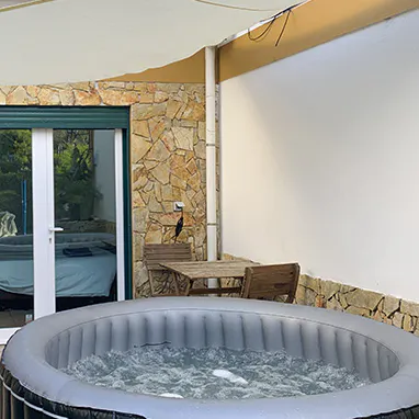 Enjoy a cool drink while soaking in the hot tub