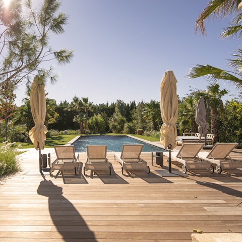 Soak up the sun beside the heated salt-water pool