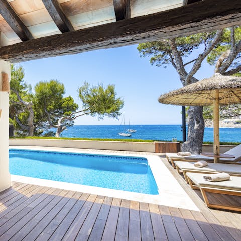 Swim in the private heated pool or make the most of the direct sea access